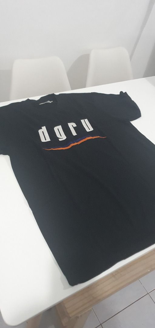 DGRV Black Graphic T-Shirt Size L (Category: Tshirts & Polo Shirts ) located in Quezon City. Submitted by sk8ter13 (Listing ID 1466443592, Image 3). Description: - Brand: DGRV - Size: Large - Color: Black - Design: Bold white chest lettering with blue and orange wavy graphic - Material: Soft, comfortable cotton - Fit: Standard crew neck with short sleeves - Condition: Clean fabric, well-maintained.