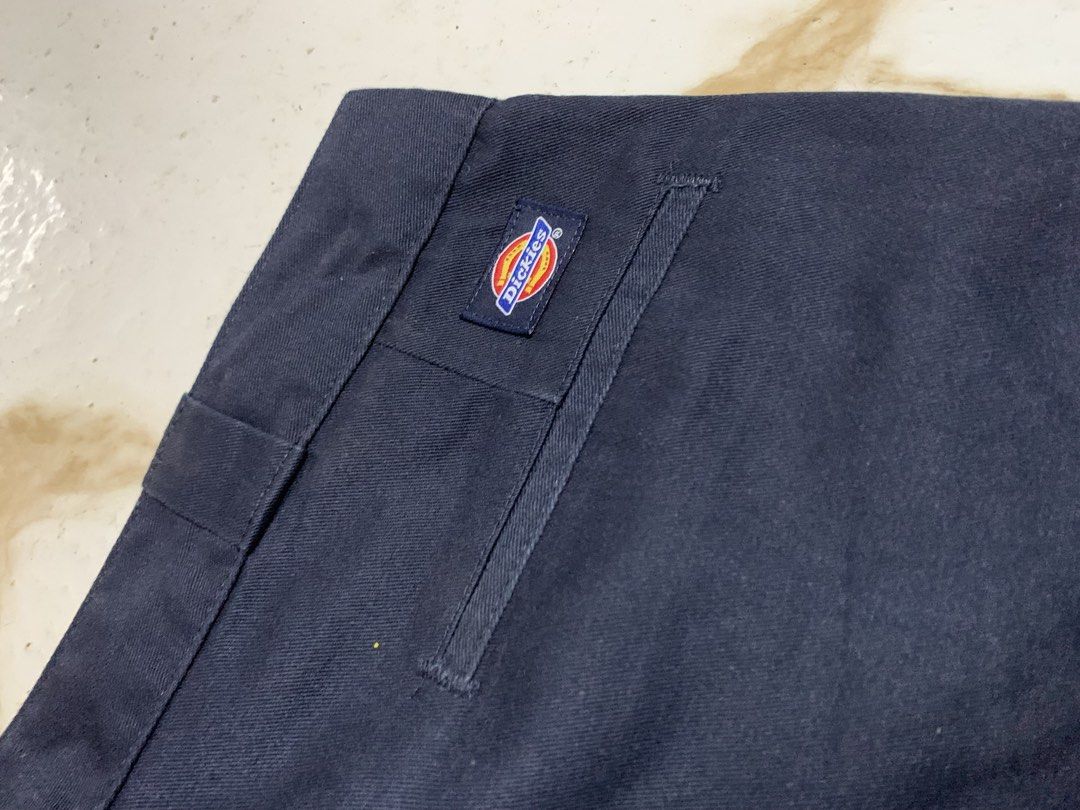Dickies Navy Blue Work Pants (Category: Trousers) located in Iloilo. Submitted by johnpullan30303 (Listing ID 1466421294, Image 3). Description: - Brand: Dickies - Item: Navy Blue Work Pants - Size: XL - Condition: Clean inside and out, well-maintained - Features: Classic fit, sturdy fabric build, belt loops, secure button closure, and iconic Dickies logo patch on the back pocket - Versatility: Perfect for daily casual outfits, workwear rotation,