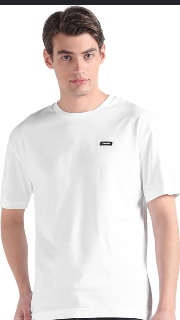 Dickies White T-Shirt with Logo Patch (Category: Tshirts & Polo Shirts ) located in Manila. Submitted by lene48 (Listing ID 1466399298, Image 1). Description: - Brand: Dickies - Color: Plain White - Fit: Regular fit, classic crew neck, short sleeves - Details: Small embroidered black logo on chest, red logo label inside collar, small red tab at bottom hem - Material: Clean, comfortable fabric ideal for daily wear - Styling: Easy to match with jea