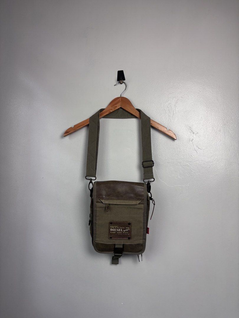 Diesel Canvas and Lesther Multi Pocket Sling Bag. (Category: Sling Bags) located in Bacoor. Submitted by jewa333 (Listing ID 1466407232, Image 1). Description: Diesel Canvas and Lesther Multi Pocket Sling Bag. Dimes: Height 11” Length 8.5” Depth 2” Excellent condition Issue: None. 🏷️1,500 only. 📥📥📥.