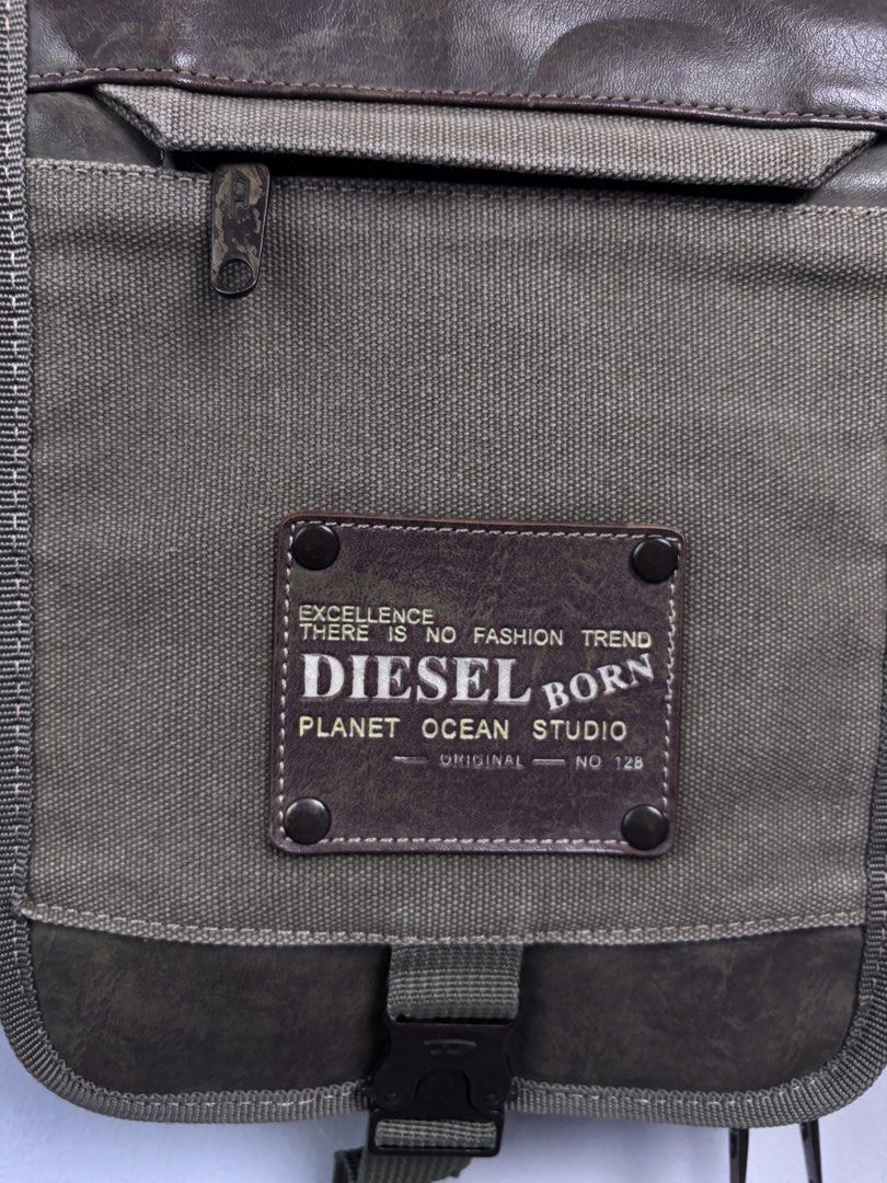 Diesel Canvas and Lesther Multi Pocket Sling Bag. (Category: Sling Bags) located in Bacoor. Submitted by jewa333 (Listing ID 1466407232, Image 3). Description: Diesel Canvas and Lesther Multi Pocket Sling Bag. Dimes: Height 11” Length 8.5” Depth 2” Excellent condition Issue: None. 🏷️1,500 only. 📥📥📥.