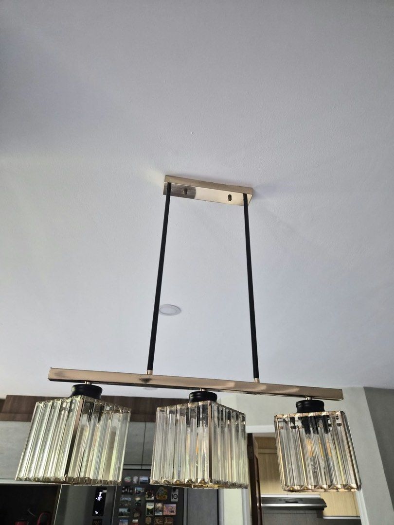 Dining and Bar Lighting Set (Category: Lighting) located in San Juan City. Submitted by curatedbymae (Listing ID 1466463733, Image 2). Description: Item: Dining and Bar Lighting Set - Dining light: 8 bulbs - Bar light: 3 bulbs - All bulbs are made out of glass and warm lighting. - Light bulbs included. Dining Lighting: P6,500.00 Bar Lighting: P4,500.00 RFS: decluttering & renovation Mode of payment: GCASH/MAYA Shipping: Grab/Lalamove/J&T (Buyer w