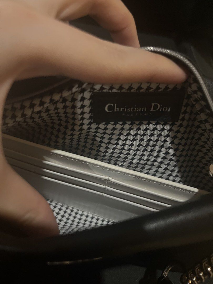 DIOR beauty black clutch minimal (Category: Clutches) located in Manila. Submitted by raspb (Listing ID 1466545925, Image 3). Description: Brand is dior. Wasnt available for selection, had no choice but to choose “others” 🥲 Parfums collection. Comes with Dior paper bag. Detachable strap. .