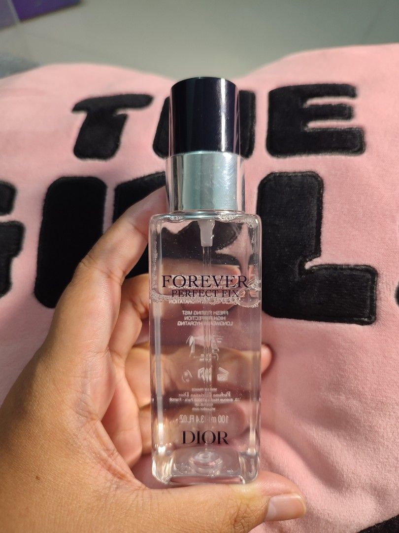 Dior Forever Perfect Fix Setting Spray 100ml (Category: Face Care) located in Manila. Submitted by menggg17 (Listing ID 1466412298, Image 2). Description: Dior Forever Perfect Fix face mist and makeup setting spray. Full size 100ml bottle. Roughly 98 percent remaining inside, sprayed only a couple of times. Original retail price around 3000. Grab it here for 2000. Message directly for any additional questions or details..