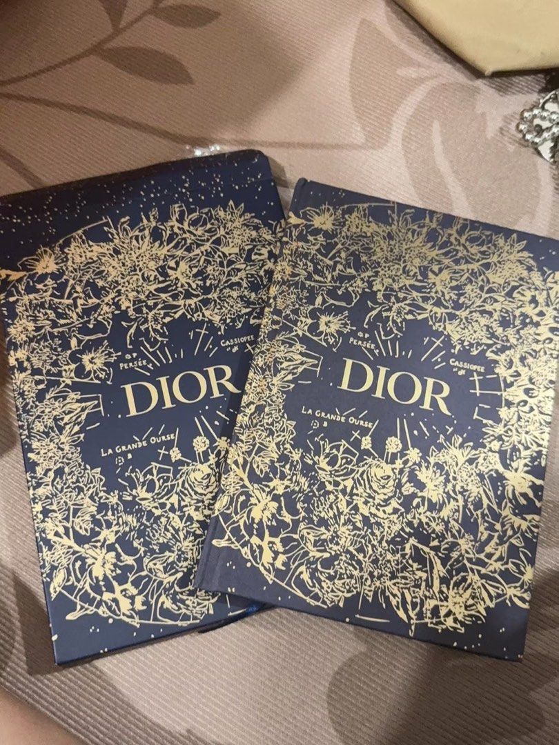 DIOR La Grande Ours Notebook Journal (Category: Stationery & School Supplies) located in Paranaque City. Submitted by jujudeclutterss (Listing ID 1466494813, Image 1). Description: - Dior GWP notebook in elegant navy blue - Features stunning gold foil constellation illustrations (La Grande Ours, Persée, Cassiopée) - Hardcover design, durable for daily use - Perfect for journaling, note-taking, or as a chic desk accessory.