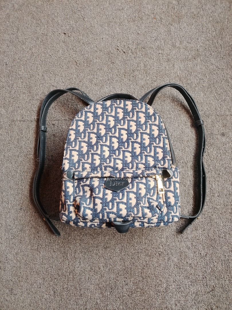 DIOR MINI BACKPACK (Category: Backpacks) located in Manila. Submitted by secondarygarments (Listing ID 1466384458, Image 1). Description: DIOR MINI BACKPACK DETAILS: - 10 inches Height - 8 Inches Width - 4 Inches Thickness - Width Adjustable Slings - Issue: Sign of usage only - 10/10 Colorrate - Excellent Condition - .