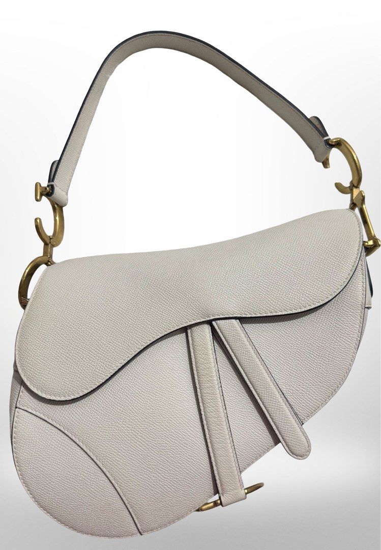 Dior saddle GHW (Category: Luxury Bags & Wallets) located in General Trias. Submitted by east10 (Listing ID 1466527960, Image 1). Description: Guaranteed authentic 100%!!!! Pm for price! Inclusions: dustbag and coa.