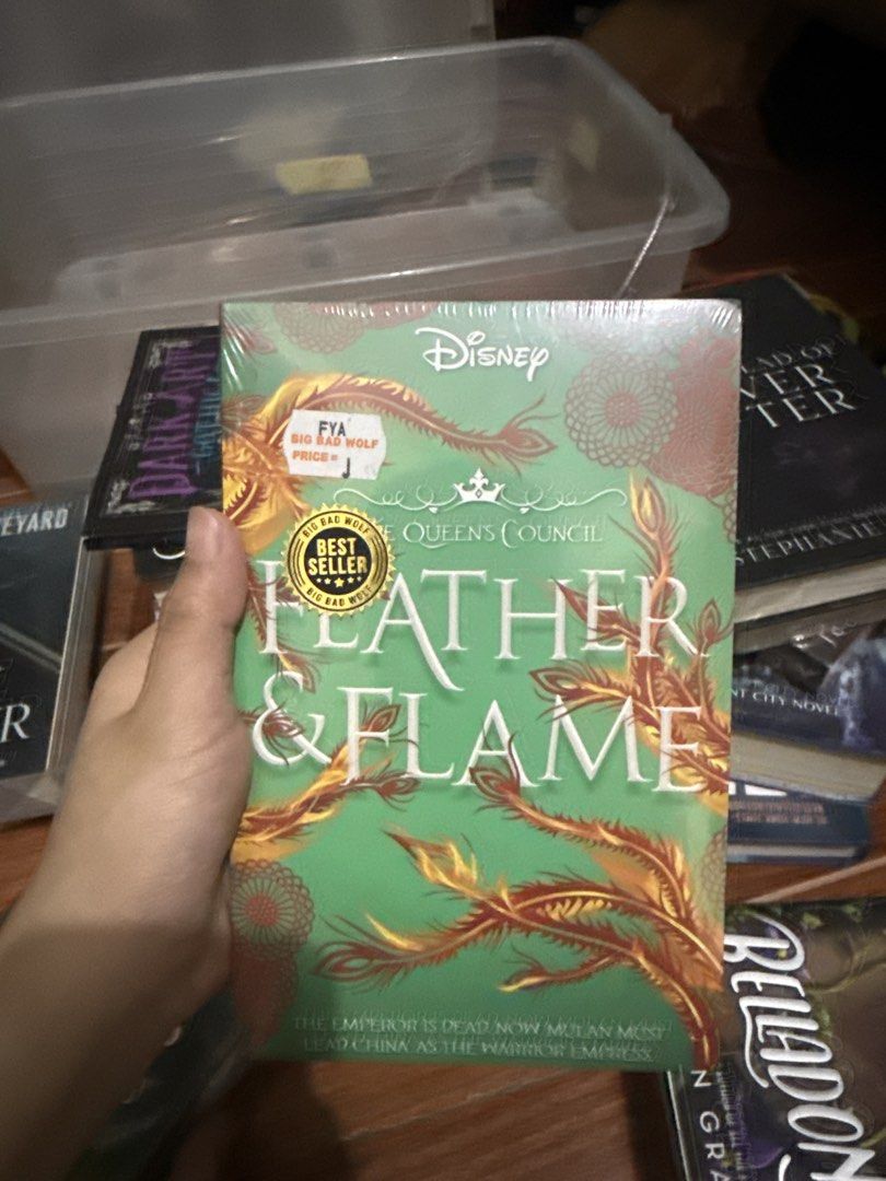 Disney The Queen's Council Feather & Flame (Category: Storybooks) located in Caloocan City. Submitted by episol (Listing ID 1466390352, Image 1). Description: Sealed, brand new. Have slight stains RFS: decluterring.