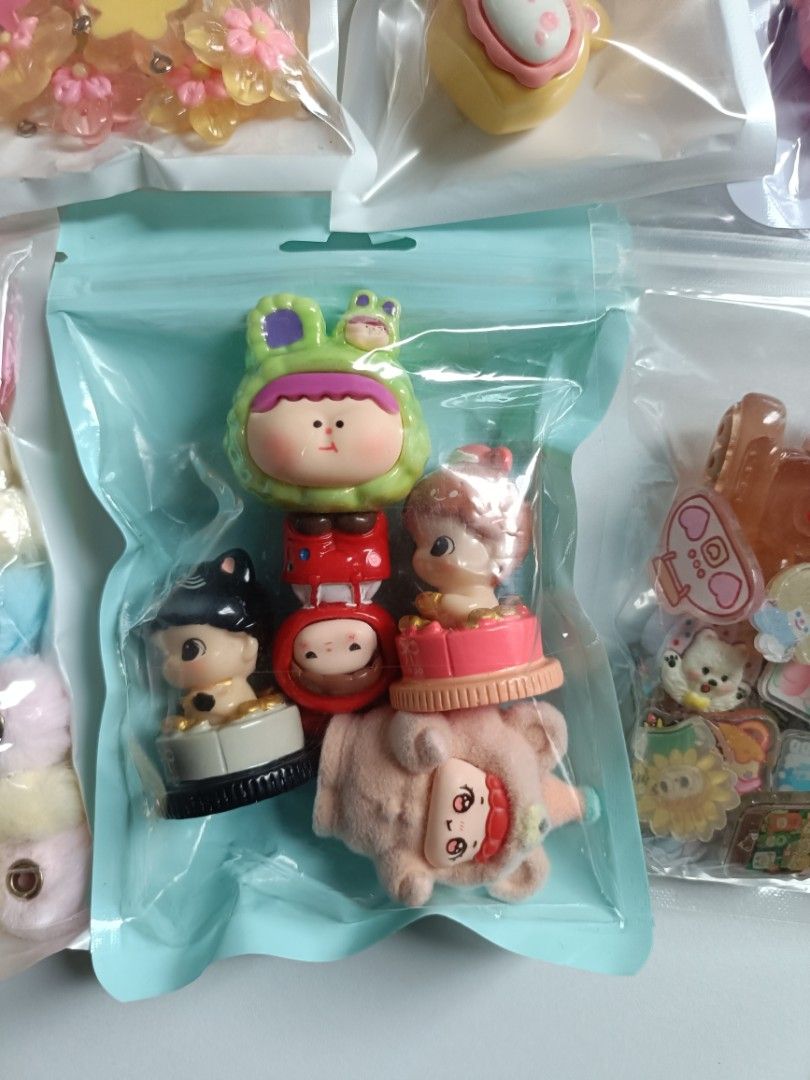 DIY Craft Charms and Accessories Bundles (Category: Craft Supplies & Tools) located in Tanza. Submitted by misumei (Listing ID 1466355987, Image 2). Description: INCLUSION - 12 pcs 3D (3 w/ hole for pin) - 7pcs Flatback Stitch beads - 7pcs Flatback SP beads - 6pcs Lollipop Pendant - 20pcs Flower pendant - 45 pcs pompom beads - mini acrylics RFS: space reset.