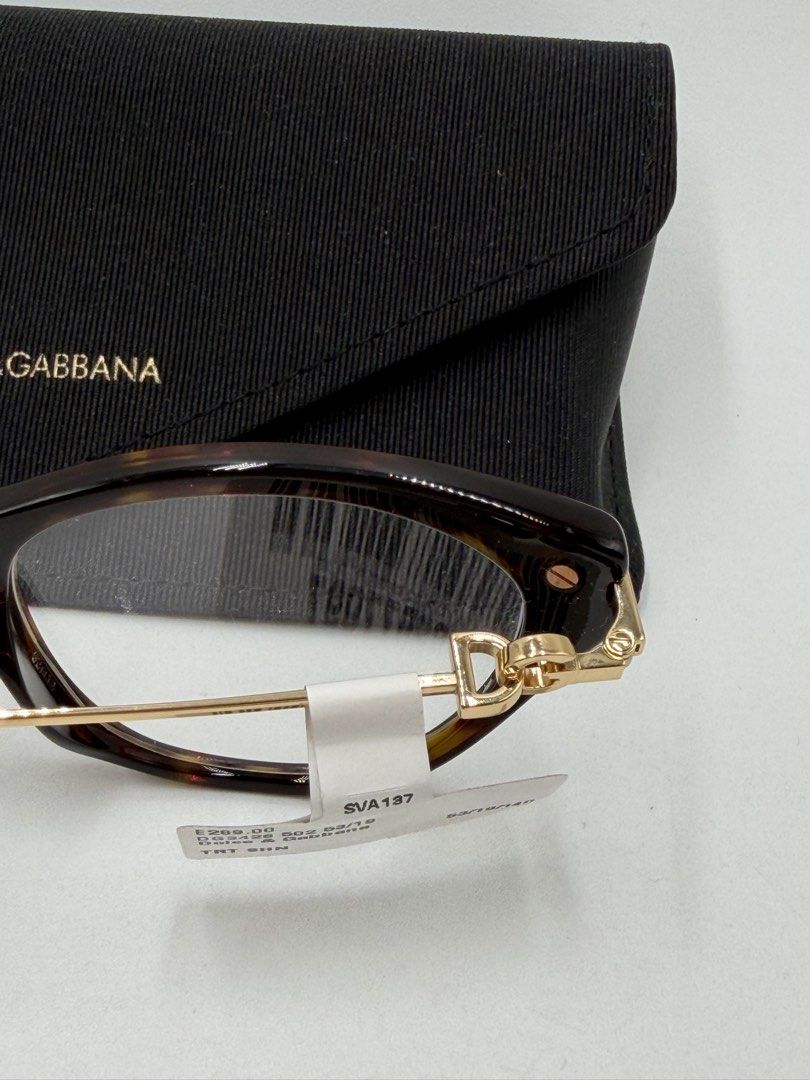 Dolce & Gabbana DG3428 502 eyeglasses (Category: Luxury Accessories) located in Quezon City. Submitted by _cmluxephilippines (Listing ID 1466365085, Image 3). Description: Dolce & Gabbana DG3428 502 eyeglasses Key Features & Specifications • Frame Style: Butterfly / Cat-eye shape • Color Code: 502 (Havana / Tortoiseshell front with gold-toned metal temples) • Dimensions: 53mm lens width, 19mm bridge width, and 140mm temple length (as visible on t