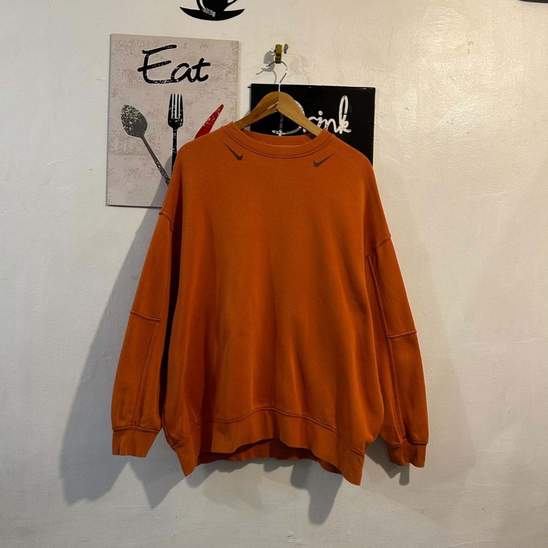 Double Small Swosh Crewneck Sweater (Category: Coats, Jackets and Outerwear) located in Quezon City. Submitted by streetwearandluxph (Listing ID 1466558917, Image 1). Description: Double Small Swosh Crewneck Sweater 1500 for both black and orange.