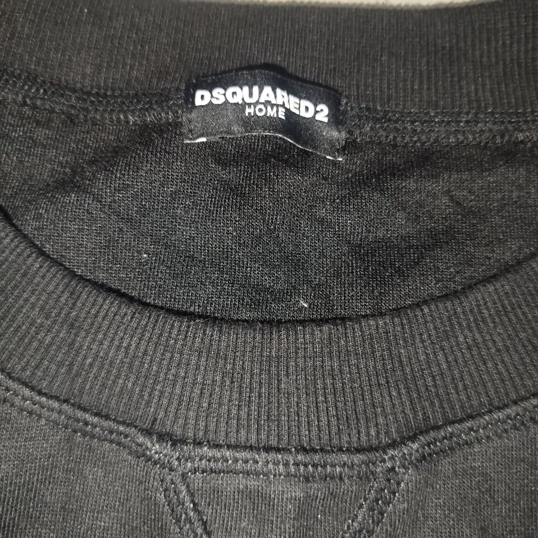 Dsquared2 Caten Brothers Black Sweatshirt Size L (Category: Coats, Jackets and Outerwear) located in Davao. Submitted by vernoneighty4 (Listing ID 1466482583, Image 2). Description: - Brand: Dsquared2 Home - Style: Black crewneck sweatshirt with ribbed cuffs and hem - Design: Large embossed circular chest graphic with 'Mr. Caten Brothers Since 1964' lettering - Size: Large (tag attached) - Material: 30% cotton, 70% polyester - Condition: Brand ne