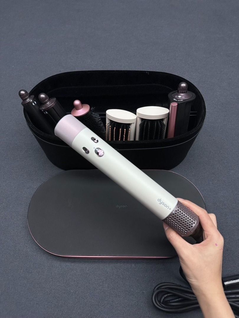 Dyson Airwrap Complete Long multi-styler and dryer HS05 (Category: Hair) located in Makati City. Submitted by silentdog-cf238b (Listing ID 1466361539, Image 2). Description: Dyson Airwrap Complete Long in ceramic pop and rose colourway. Includes storage case, presentation box, and multiple attachments like smoothing brushes and curling barrels. Powerful airflow, intelligent heat control..