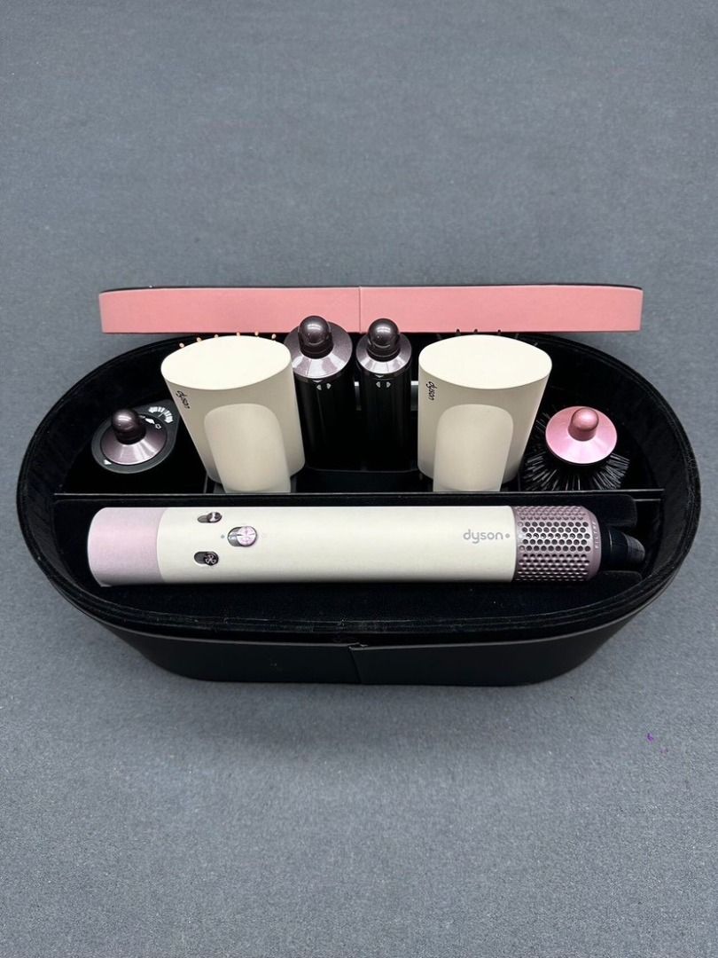 Dyson Airwrap Multi-Styler Complete (Category: Hair) located in Paranaque City. Submitted by ulikakheli02916 (Listing ID 1466456405, Image 3). Description: - Authentic Dyson hair styling set in limited Ceramic Pop and Pink - Fully functional styling tool with all attachments included - Comes with main wand handle, curling barrels, smoothing brushes, and round volumising brush - Includes original presentation case - Easy snap-on magnetic attachmen
