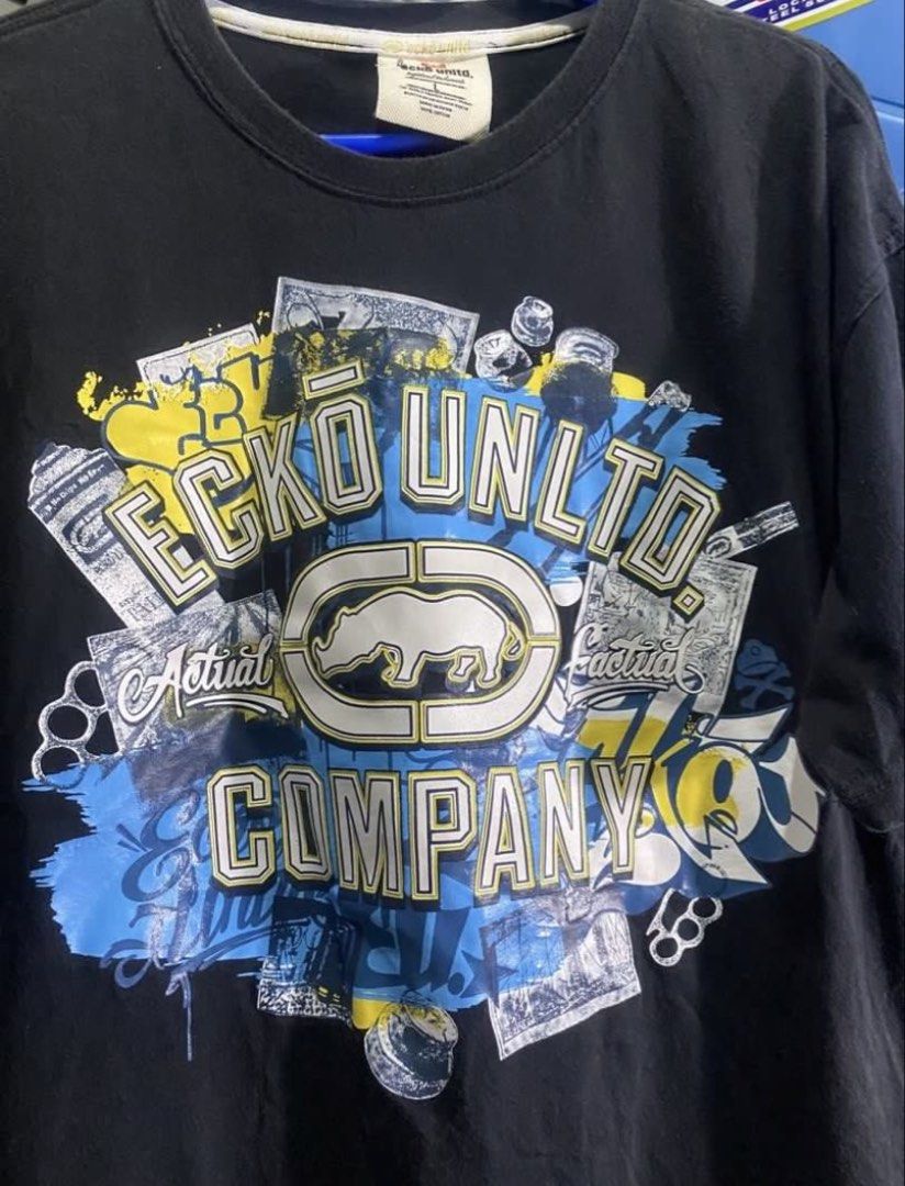 Ecko Tshirt Pop Print Y2k (Category: Tshirts & Polo Shirts ) located in Rizal. Submitted by kenrick_2003 (Listing ID 1466360772, Image 2). Description: Modern Tag Ecko Shirt Pop Print Size: Large Measurements Width: 22 Length: 29 Authentic 💯 Condition: Like new, nirestitch lang ngkonti yung loose stitch sa hem check last pic..