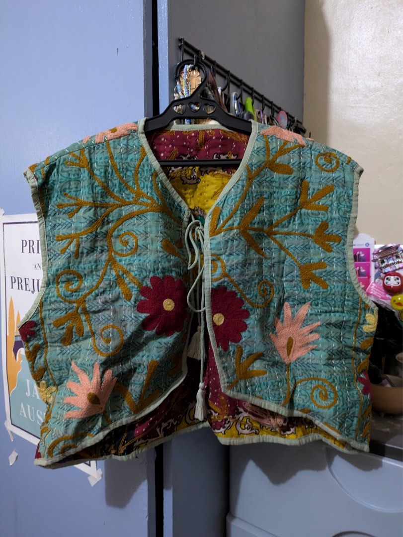 ELINORA Kantha Embroidered Reversible Vest (Category: Coats, Jackets and Outerwear) located in Quezon City. Submitted by albie79 (Listing ID 1466351189, Image 1). Description: ELINORA (one of their earliest vests collection from Greenbelt, bought in 2024) FREE SF VIA GGX or LALAMOVE Used ONCE for an event SUPER GANDA!!!! Wala kang kapareho! - Greenish Blue quilted vest with intricate kantha stitching - Vibrant floral embroidery in yellow, pink, a