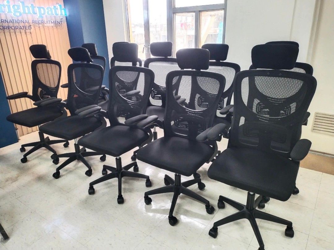 Ergonomic Mesh Office Chair with Adjustable Headrest and Armrests (Category: Office Furniture & Fixtures) located in Manila. Submitted by lieselrell90474 (Listing ID 1466367849, Image 3). Description: - Ergonomic black mesh office chair designed for long hours - Breathable backrest to keep you cool and comfortable - Adjustable headrest and padded armrests for solid support - Smooth-rolling casters on a sturdy five-star base - Multiple units avail