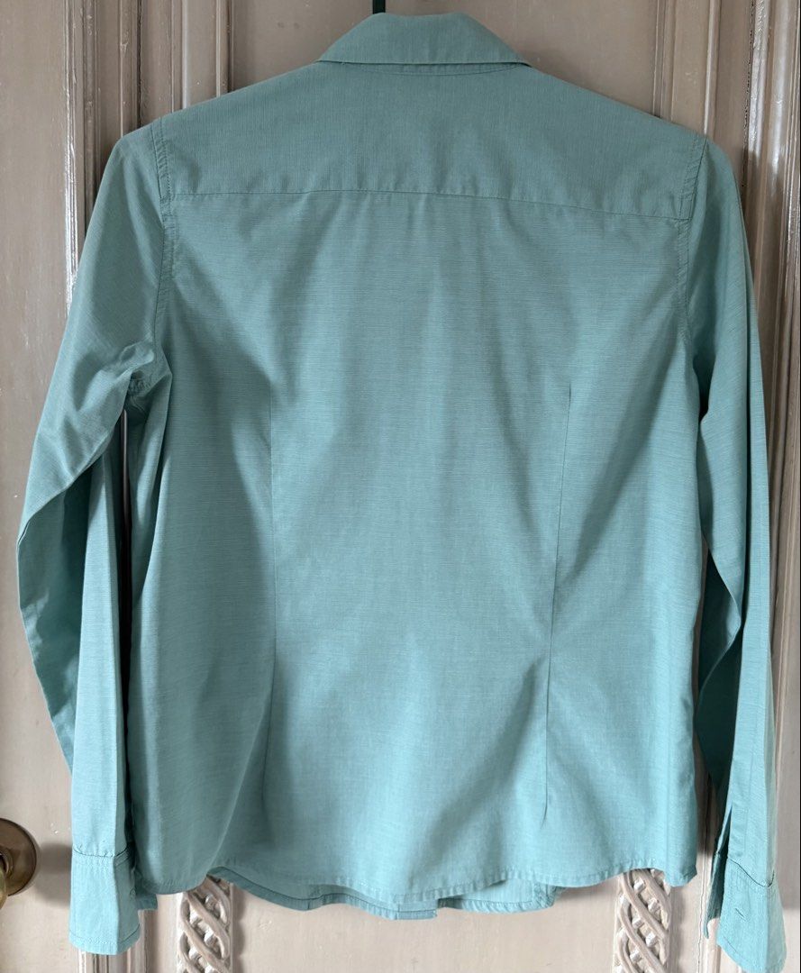 Esprit Basic Green Cotton Long Sleeve Button-Up Shirt (vintage) (Category: Longsleeves) located in Quezon City. Submitted by d.othersetc (Listing ID 1466374327, Image 2). Description: - Brand: Esprit - Style: Basic button-up shirt with front button closure - Color: Sage green - Size: Women's Small (Pit-to-pit: ~19 inches) - Material: 100% Cotton - Details: Long sleeves with button cuffs, classic collar, and front/back darting for a fitted, flatte