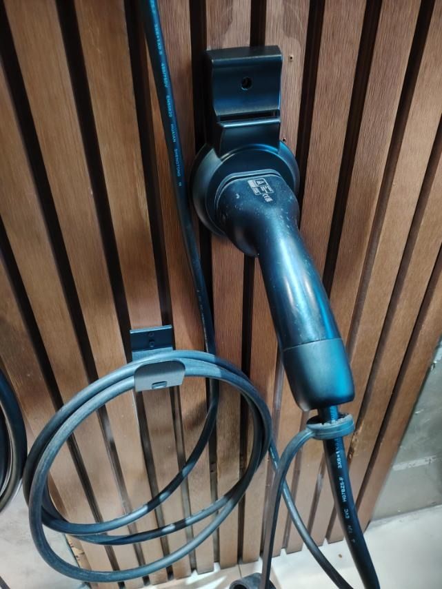 Ev Charger 7kw Ocpp Ready (Category: Everything Else Others) located in Mandaluyong City. Submitted by jazhruiz (Listing ID 1466441784, Image 2). Description: - 7kW power output for efficient home or commercial EV charging - OCPP ready for smart management and connectivity - Sleek grey and white wall-mounted enclosure with integrated digital display - Clear vertical LED status indicator lights - Durable tethered charging cable with organized wall