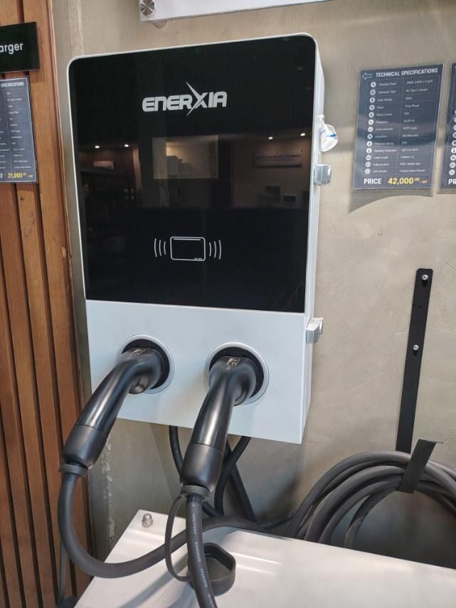 EV CHARGER OCPP READY 44KW (Category: Everything Else Others) located in Mandaluyong City. Submitted by jazhruiz (Listing ID 1466439795, Image 2). Description: - Brand: ENERXIA - Model/Type: OCPP Ready 44KW EV Charger - Design: Wall-mounted dual port system with black and white finish - Features: Integrated display screen and RFID/card reader area - Cables: Dual heavy-duty black charging cables included - Condition: Brand new, clean, and ready fo