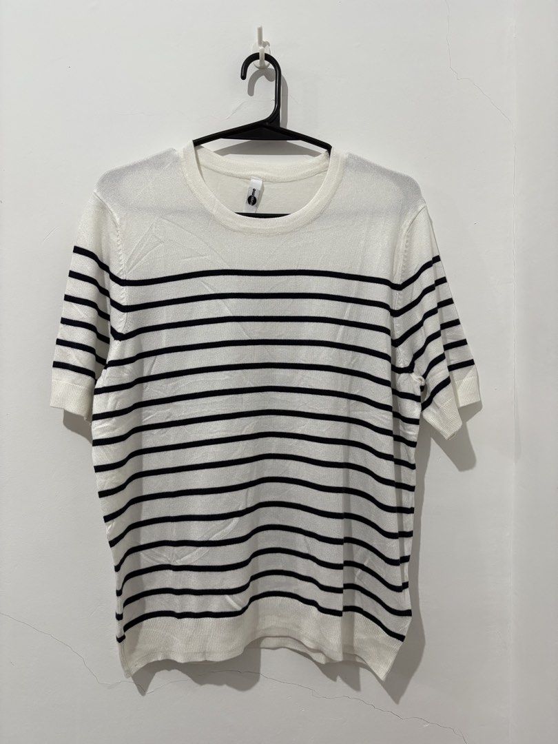 Everme Knit Tops Bundle (White Stripe & Solid Black) (Category: Sleeveless) located in Manila. Submitted by coolphoenix_f1e702 (Listing ID 1466444916, Image 1). Description: - Brand: Everme - Size: L - Quantity: 2 knit tops - Top 1: White with black horizontal stripes, short sleeves, crew neck - Top 2: Solid black, dropped shoulders, relaxed fit - Details: Ribbed hem and cuffs on both - Material: Soft knit, comfortable for daily wear - Versatile: