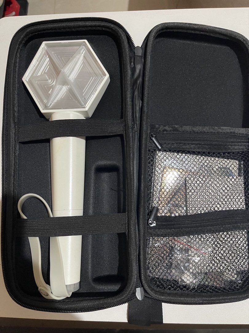 EXO Lightstick Version 3 with Fanlight Pouch (Category: K-Wave Merchandise) located in San Pablo. Submitted by vrmthrsainz (Listing ID 1466429120, Image 1). Description: - Includes EXO Photocard and Hologram Sticker - Lightstick and pouch still in great condition - price negotiable ‼️ - mod: j&t or lbc.