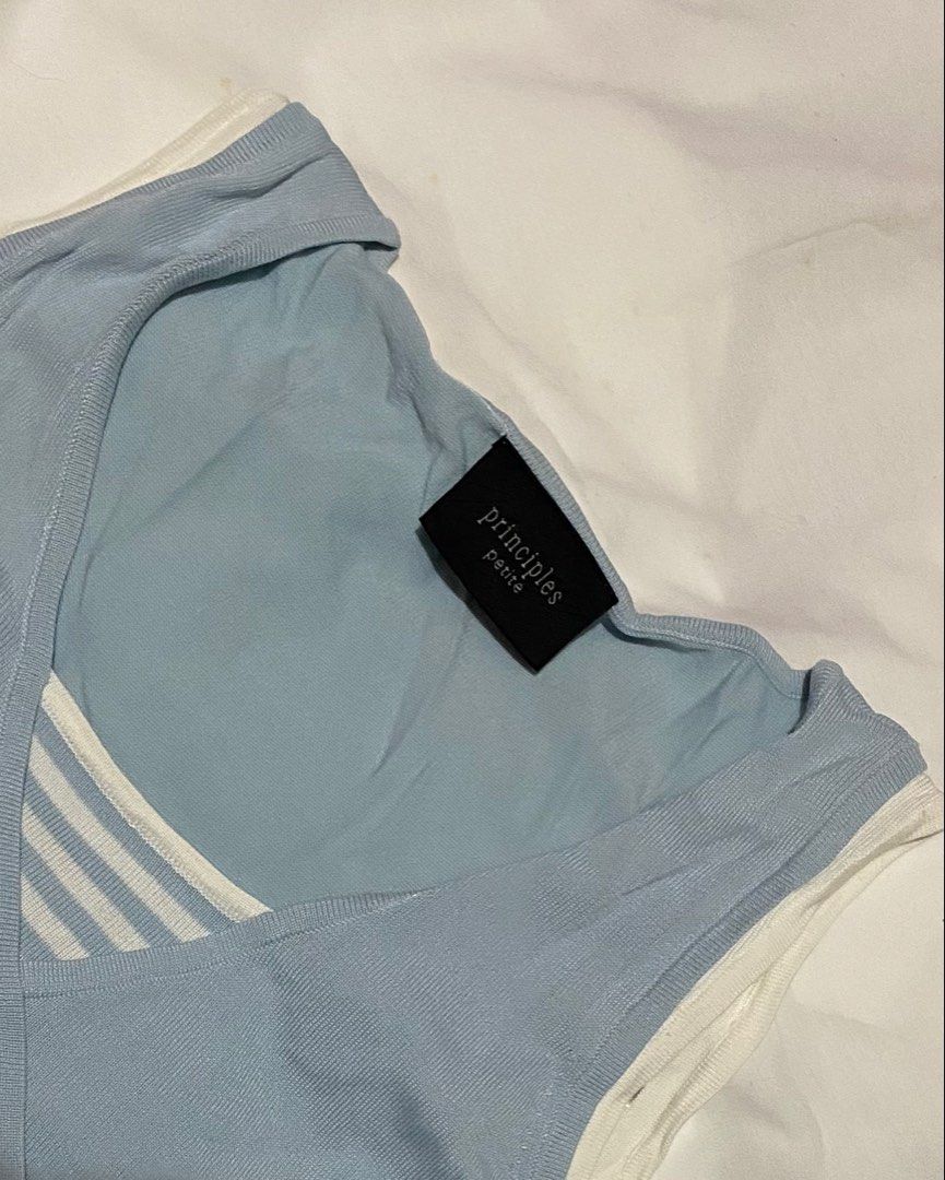 FAUX-LAYERED STRIPED TANK (Category: Sleeveless) located in Pasig City. Submitted by thriftbycelle (Listing ID 1466392515, Image 2). Description: the perfect 2-in-1 layered top look without the bulk! light blue sleeveless tank with white contrast trims and a striped v-neck inset. super cute styled with low-rise jeans or a pleated skirt! 𐙚 Brand: Principles Petite 𐙚 Size: Fits S–M — DM for exact flat measurements! 𐙚 Condition: 8/10 (fabric is s