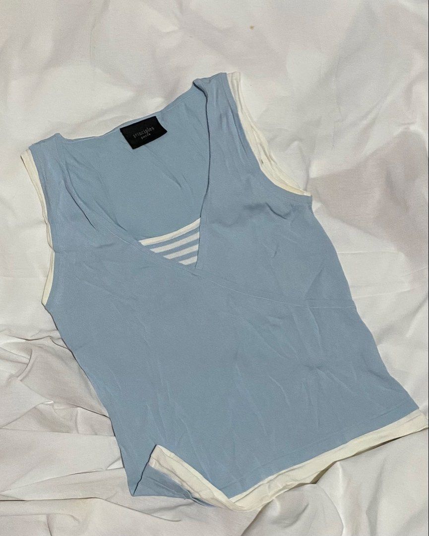 FAUX-LAYERED STRIPED TANK (Category: Sleeveless) located in Pasig City. Submitted by thriftbycelle (Listing ID 1466392515, Image 1). Description: the perfect 2-in-1 layered top look without the bulk! light blue sleeveless tank with white contrast trims and a striped v-neck inset. super cute styled with low-rise jeans or a pleated skirt! 𐙚 Brand: Principles Petite 𐙚 Size: Fits S–M — DM for exact flat measurements! 𐙚 Condition: 8/10 (fabric is s