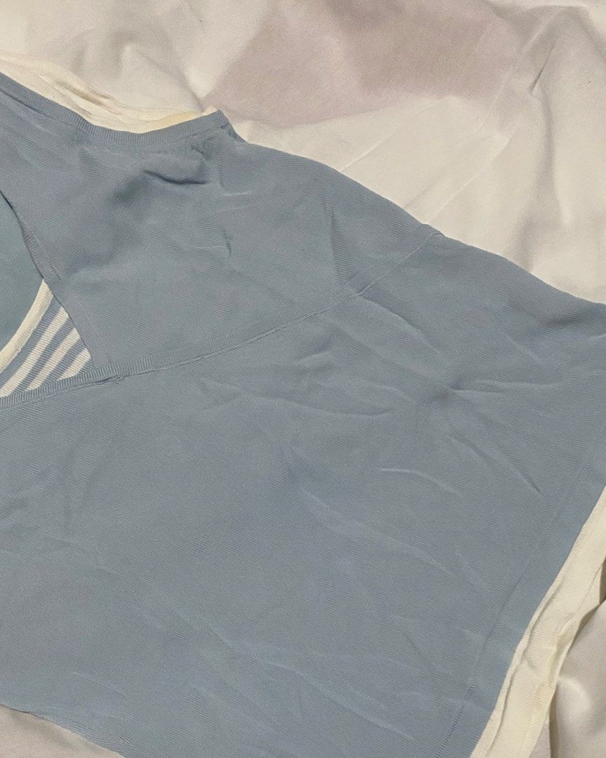 FAUX-LAYERED STRIPED TANK (Category: Sleeveless) located in Pasig City. Submitted by thriftbycelle (Listing ID 1466392515, Image 3). Description: the perfect 2-in-1 layered top look without the bulk! light blue sleeveless tank with white contrast trims and a striped v-neck inset. super cute styled with low-rise jeans or a pleated skirt! 𐙚 Brand: Principles Petite 𐙚 Size: Fits S–M — DM for exact flat measurements! 𐙚 Condition: 8/10 (fabric is s