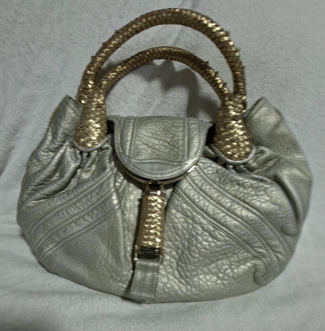 Fendi ( spy bag ) (Category: Tote Bags) located in Manila. Submitted by givesudlyt08 (Listing ID 1466472777, Image 1). Description: authentic fendi spy bag , my personal used , gold and silver , sign of used still head turner.