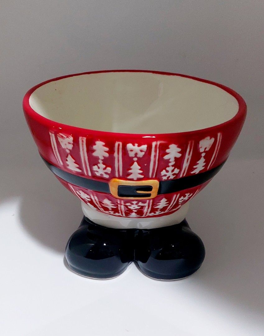 Festive Christmas Holiday Tableware Photo Frame Collection (Category: Dinnerware & Cutlery) located in Cainta. Submitted by veronica2277 (Listing ID 1466358113, Image 2). Description: Bundle of festive holiday items. Includes star-shaped snowflake bowls in red and gold, Santa suit cookie jar or treat container, Christmas tree cookie jar with star topper, plate and mug set with box, and a red wooden picture frame with gift box toppers. Cute holida
