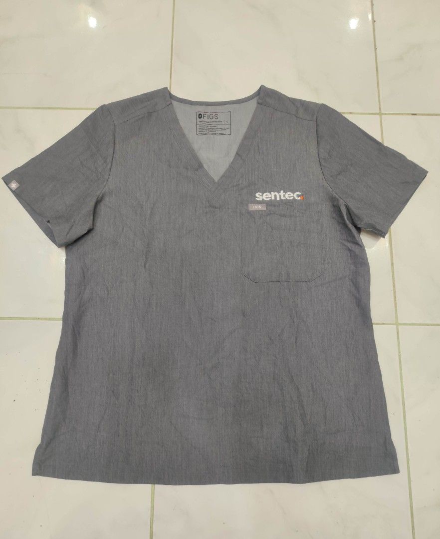 FIGS Scrub top (Category: Blouses) located in Santa Cruz. Submitted by mark_grimaldo (Listing ID 1466502536, Image 1). Description: FIGS Scrub top ✅Size: L (21 x 27) ✅P 550 ✅Excellent condition ❌Issue: Embroided logo Laguna Area DM📩📩📩.