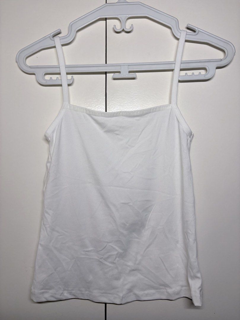 Floral Print White Cami Tank Top (Category: Sleeveless) located in Paranaque City. Submitted by honeykkkk (Listing ID 1466480757, Image 2). Description: • Details: Classic straight neck/square-style neckline, thin spaghetti straps, and a vibrant tropical hibiscus floral graphic print on the front. Clean solid white back. Lightweight, comfortable, and perfect for casual beach days or summer layering. • Condition: Excellent condition — worn once on