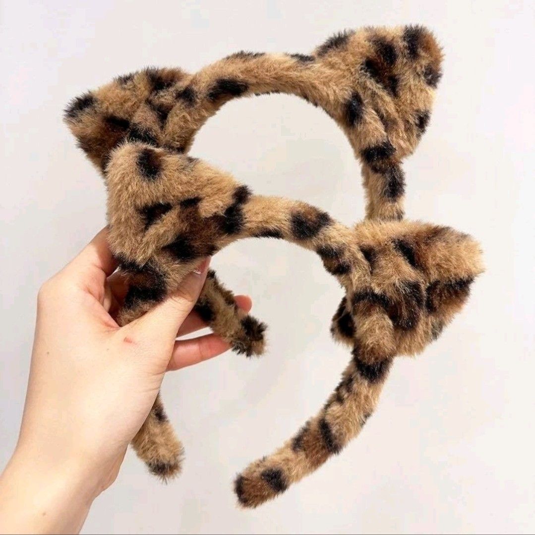 Fluffy Animal Ears Headband Set Bunny Leopard Cat (Category: Hair Accessories) located in Apalit. Submitted by randomsellshop (Listing ID 1466464713, Image 2). Description: Set of three furry animal ear headbands. Includes fluffy pink and white bunny ears, brown leopard print cat ears, and solid black cat ears. Soft plush material throughout. Fun for costumes, parties, or everyday fun. Lightweight and comfortable to wear..