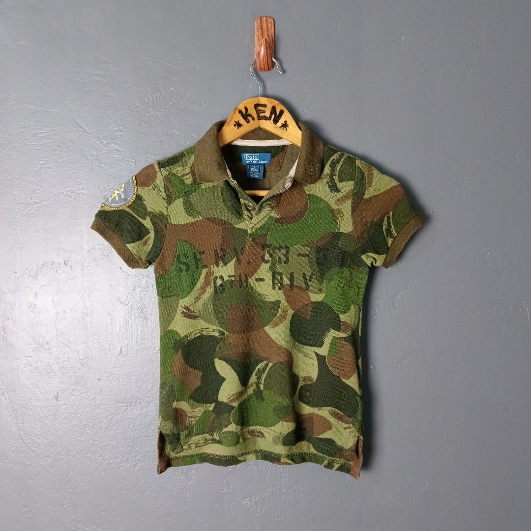 For Kids - Ralph Lauren (Category: Babies & Kids Fashion) located in Bacolod City. Submitted by drop.ph (Listing ID 1466435903, Image 1). Description: Ralph Lauren - Camo Polo Authentic *Size 5yrs - 13x18, 19 back *Excellent cloth *Crack prints at the back *Price: 499php *Add SF if outside Bacolod City.