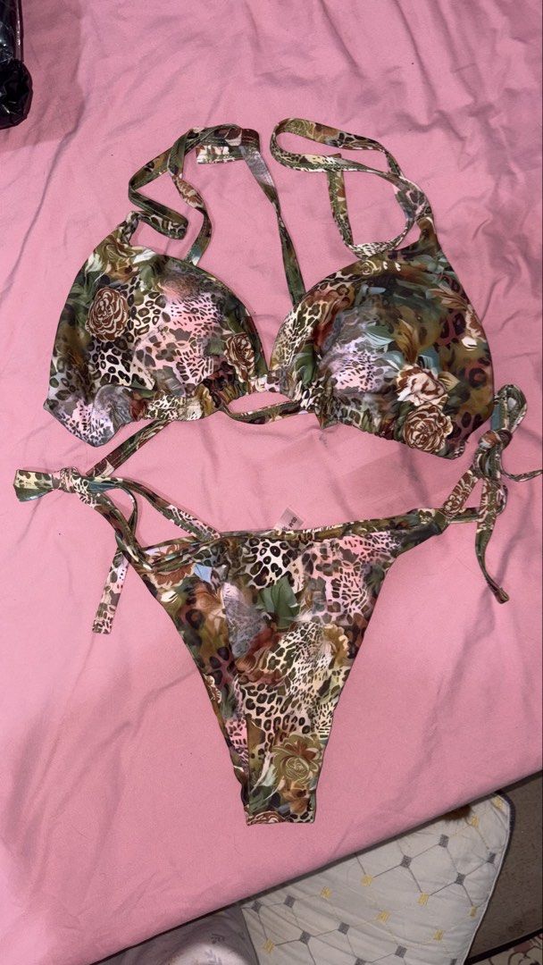 For take all - Large Swimsuit (Category: Bikinis & Swimsuits) located in Imus. Submitted by dojacant (Listing ID 1466396755, Image 1). Description: For take all only. Can fit L-XL All Brand New with Pouch.