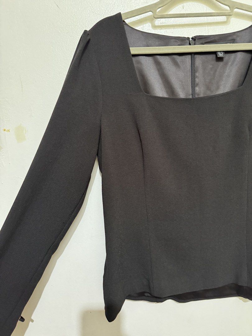 Forever New Black Square Neck Blouse Size US 8 (Category: Blouses) located in Manila. Submitted by tia_beanie13 (Listing ID 1466485924, Image 3). Description: - Brand: Forever New - Size: AUS 12 / EUR 40 / USA 8 - Color: Classic Black - Design: Square neckline, structured body fit, back zip closure, and upper back satin lining - Statement Detail: Long sleeves with trendy lace-up grommet cuffs - Condition: Clean, excellent, and ready to wear.