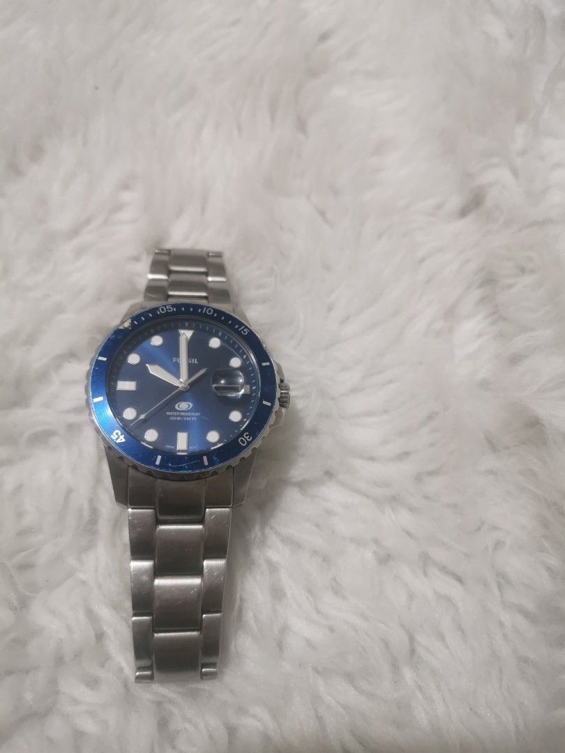 Fossil Blue Dial Stainless Steel Dive Watch (Category: Men's Watches) located in Manila. Submitted by cheapcellphone (Listing ID 1466559164, Image 3). Description: - Brand: Fossil men's watch - Design: Classic dive style with striking blue dial and rotating bezel - Materials: Durable stainless steel case and bracelet PAMIGAY PRESYO NA SA LASTPRICE KUNIN NYO NA Libre na lng if proven FAKE 100% LEGIT - Movement: Reliable battery-operated quartz mov
