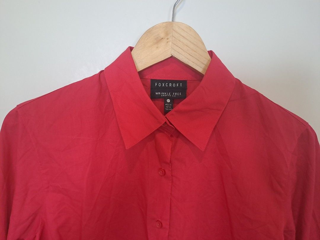 Fox crop red longsleve (Category: Longsleeves) located in Manila. Submitted by joanbalde39643 (Listing ID 1466438540, Image 2). Description: This item is a Foxcroft wrinkle-free button-down shirt in a vibrant solid red hue. It features a classic pointed collar, a button-up front, and practical 3/4-length sleeves with cuff details. Made from a signature low-maintenance cotton blend fabric, this tailored top is highly regarded for maintaining a cri