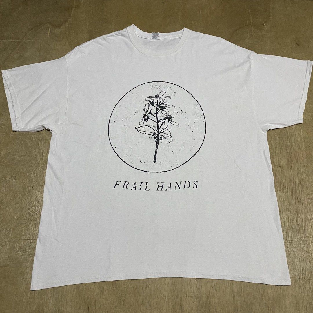 FRAIL HANDS (Category: Tshirts & Polo Shirts ) located in Makati City. Submitted by kktrippy (Listing ID 1466507644, Image 1). Description: - FRAIL HANDS - Nice flower design - Good condition - XL - Gildan heavy cotton tear away tag - Measurement/dimension is on the tape 2nd slide.