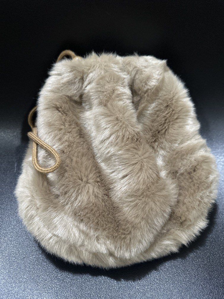 Fur Drawstring Pouch (Category: Purses & Pouches) located in Manila. Submitted by krystalchewey_ (Listing ID 1466410597, Image 1). Description: Used Actual Photo Posted 245php Fur .
