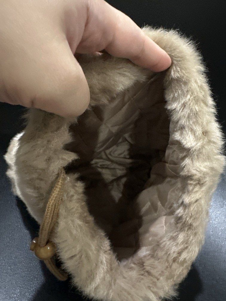 Fur Drawstring Pouch (Category: Purses & Pouches) located in Manila. Submitted by krystalchewey_ (Listing ID 1466410597, Image 3). Description: Used Actual Photo Posted 245php Fur .