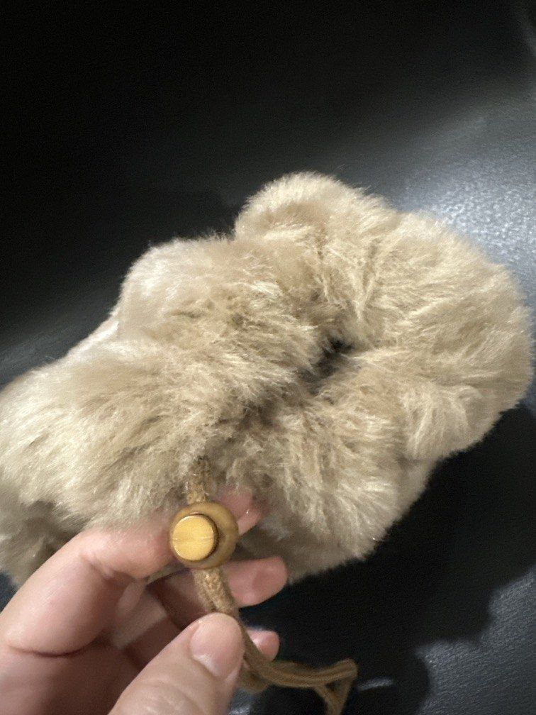 Fur Drawstring Pouch (Category: Purses & Pouches) located in Manila. Submitted by krystalchewey_ (Listing ID 1466410597, Image 2). Description: Used Actual Photo Posted 245php Fur .