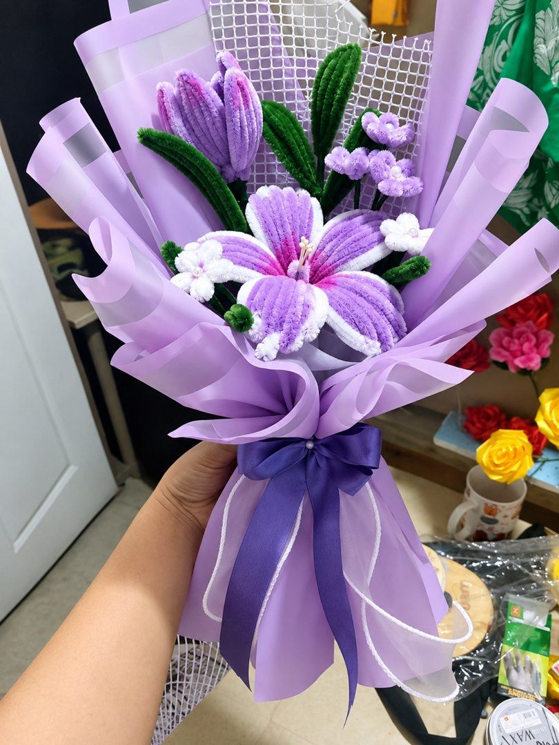 Fuzzy Wire Flower Bouquet (Category: Flowers & Bouquets) located in Bacoor. Submitted by owenjii (Listing ID 1466537775, Image 2). Description: - Handmade pipe cleaner floral arrangement - Includes a large centerpiece flower, a tulip, accent flowers, and green leaves - Elegantly wrapped in decorative paper with a matching satin bow - Ideal gift for birthdays, graduations, anniversaries, and other special occasions - Available in clean, vibrant co