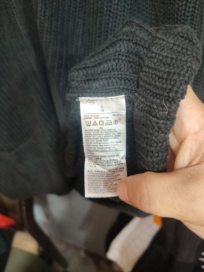 GAP Black Ribbed Button-Up Cardigan (Category: Coats, Jackets and Outerwear) located in Manila. Submitted by momofunodos (Listing ID 1460198733, Image 3). Description: - Classic black GAP cardigan - Ribbed knit texture - Button-up front - Two front pockets - Ideal for layering over tops or dresses - Versatile for casual or dressed-up looks - Soft and comfortable material.
