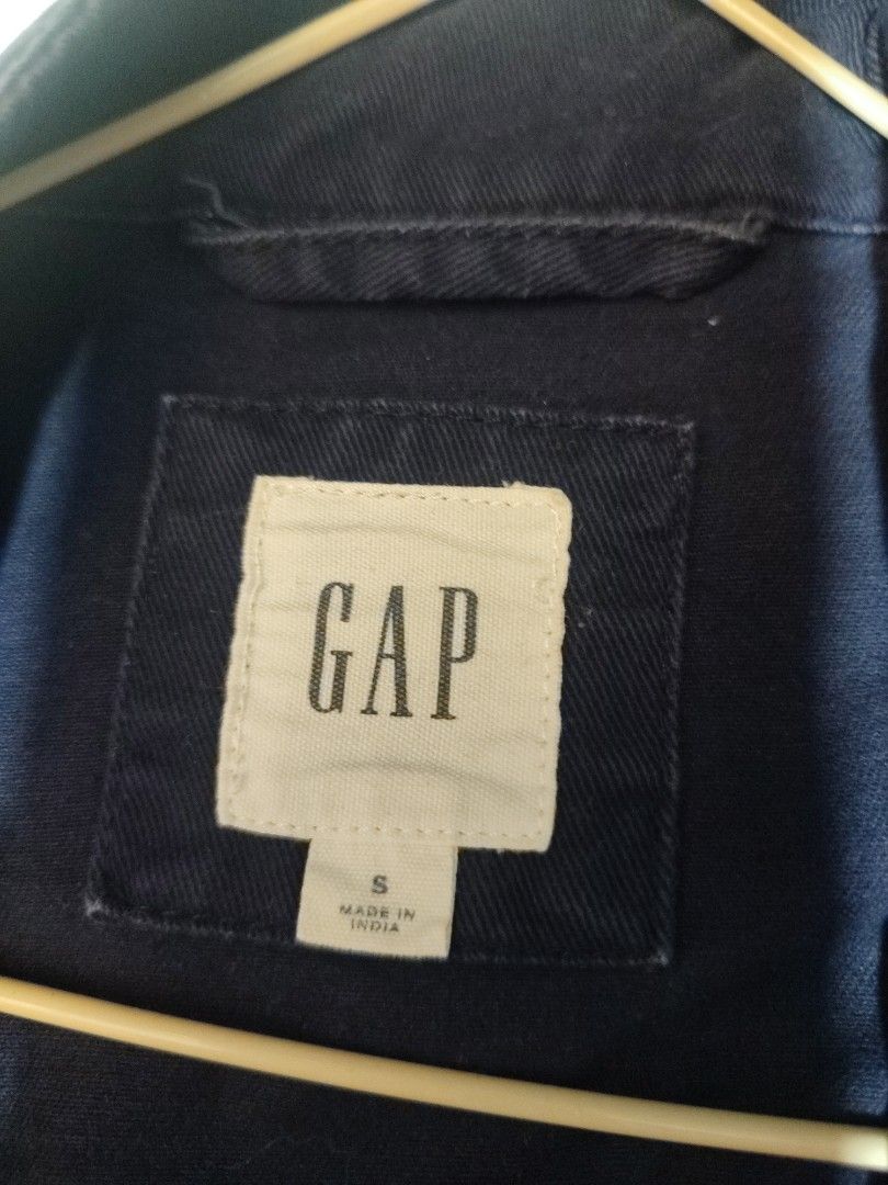 GAP Blue Utility Jacket Size S (Category: Coats, Jackets and Outerwear) located in Manila. Submitted by momofunodos (Listing ID 1460197680, Image 2). Description: - Cool blue utility jacket from GAP - Features a drawstring waist for adjustable fit - Two chest pockets and two side pockets for storage - Zip-up front with a snap button closure overlay - Ideal for layering and casual wear.
