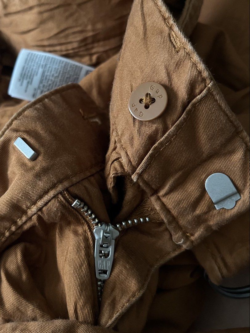 Gap Khakis Shorts Size 2 (Category: Shorts) located in Naga. Submitted by rmapprl (Listing ID 1466495954, Image 3). Description: - Brand: Gap - Style: Khaki shorts with waist belt and ring buckle - Size: 2 (Fits waistline 26 to 27 inches) - Length: 22 inches - Leg Hole: 11 inches - Material: 100% cotton, non-stretch - Condition: Very good overall with very minimal discoloration - Code: 0154-38.