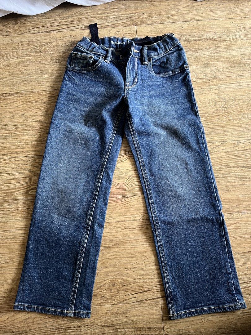 GapKids 1969 Jeans 8 Regular (Category: Babies & Kids Fashion) located in Pasig City. Submitted by dyanise (Listing ID 1466399272, Image 1). Description: - Brand: GapKids 1969 - Size: 8 Regular - Wash: Classic blue denim - Fit: Straight leg with adjustable inner elastic waistband - Details: Front and back pockets, metal button closure, and zippered fly - Condition: Excellent everyday wear staple .
