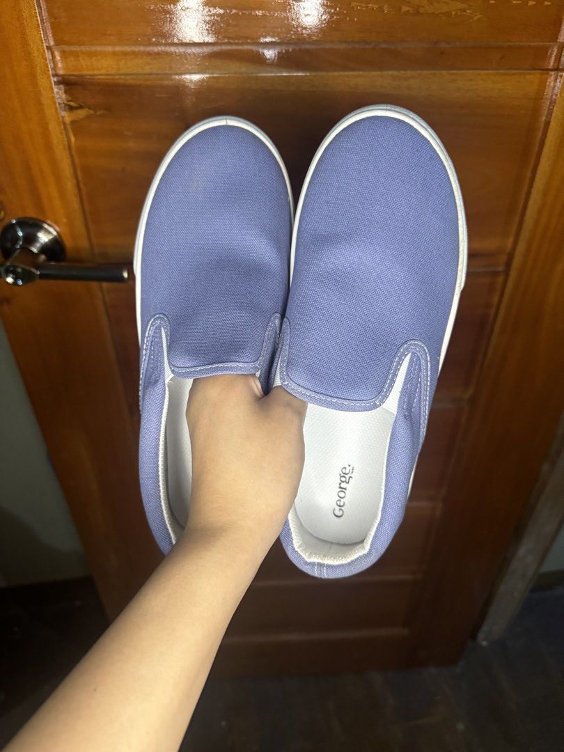 George Blue Canvas Slip-On Shoes (Category: Casual Shoes) located in Baguio. Submitted by heath2600 (Listing ID 1466452955, Image 2). Description: - Brand/Model: George canvas slip-on shoes - Color: Nice blue shade with matching blue trim on white rubber soles - Condition: Clean, hardly worn (like new) - Style: Easy casual wear - Best for: Everyday errands or hanging out.