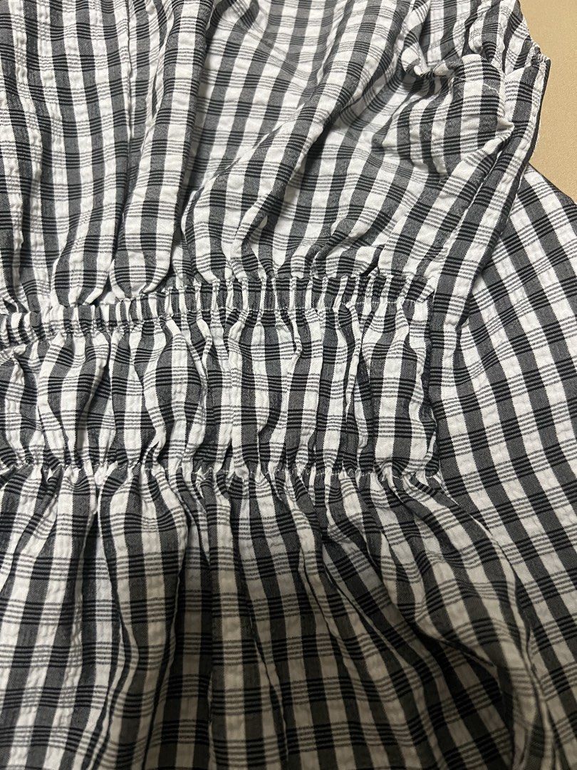 Gingham Sleeveless Top (Category: Sleeveless) located in Manila. Submitted by malggg (Listing ID 1466518249, Image 3). Description: (Decluttering again!) Got this last year from the 🍊 app (see photo #5) I knew I got the wrong size (XXS-XS) but I was still able to wear it a couple of times since it has a garterized back (see photos #3 and #4) so it can fit an XS-S frame. I re-ordered in a size S-M, I love it better, and I am more comfortable — so